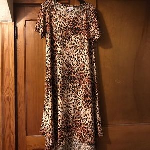 Small Carly. Worn once. Much sought  after print